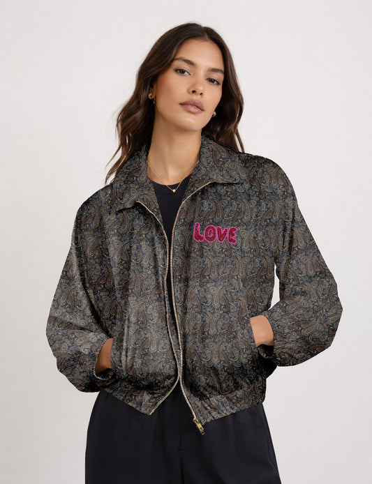 Love Bomber Jacket made from recycled fabric, featuring hand-stitched Aari embroidery. A unique piece of zero-waste clothing, part of the circular fashion movement. Designed with upcycled materials for a stylish yet environmentally friendly clothing choice.
