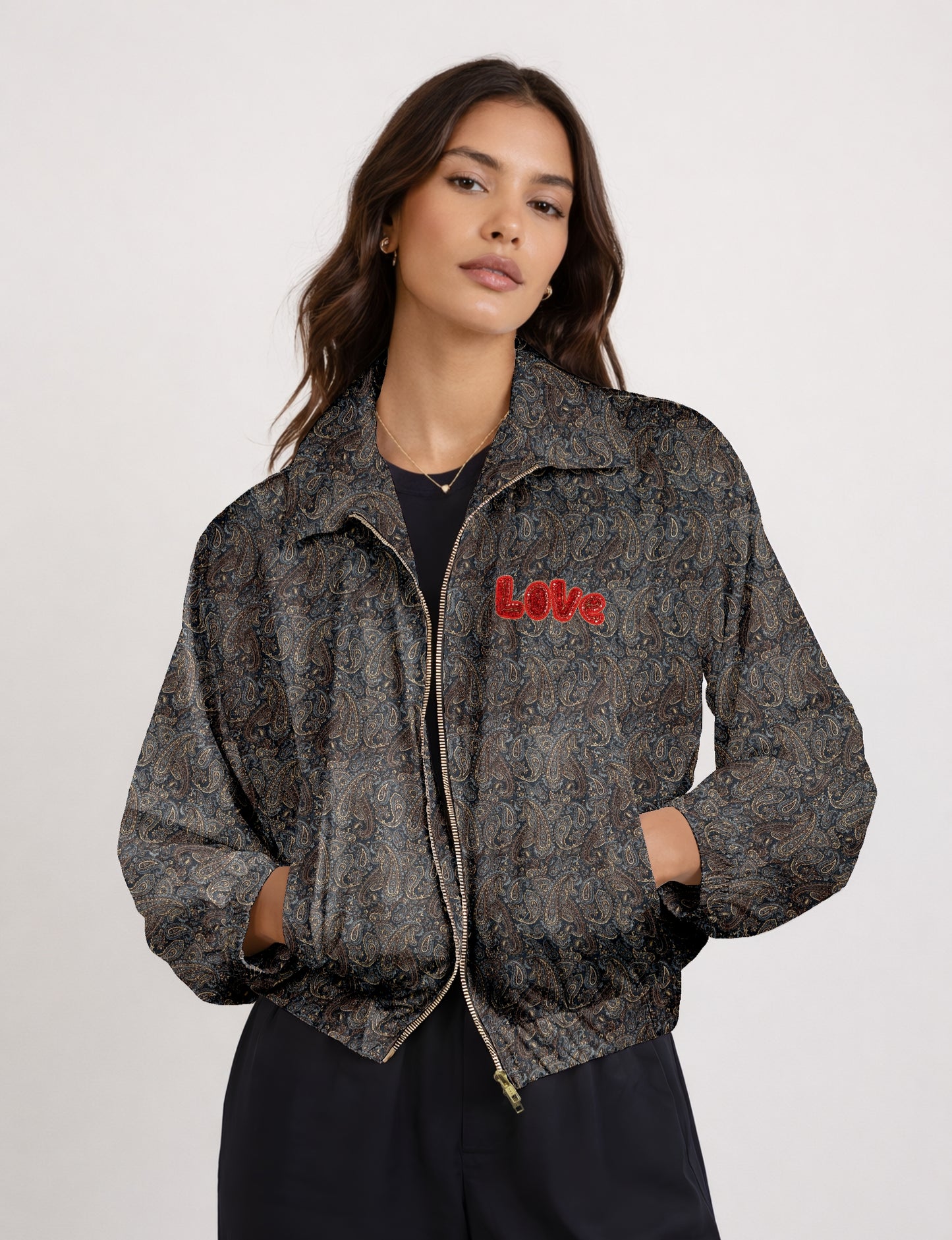 Love Bomber Jacket made from recycled fabric, featuring hand-stitched Aari embroidery. A unique piece of zero-waste clothing, part of the circular fashion movement. Designed with upcycled materials for a stylish yet environmentally friendly clothing choice.