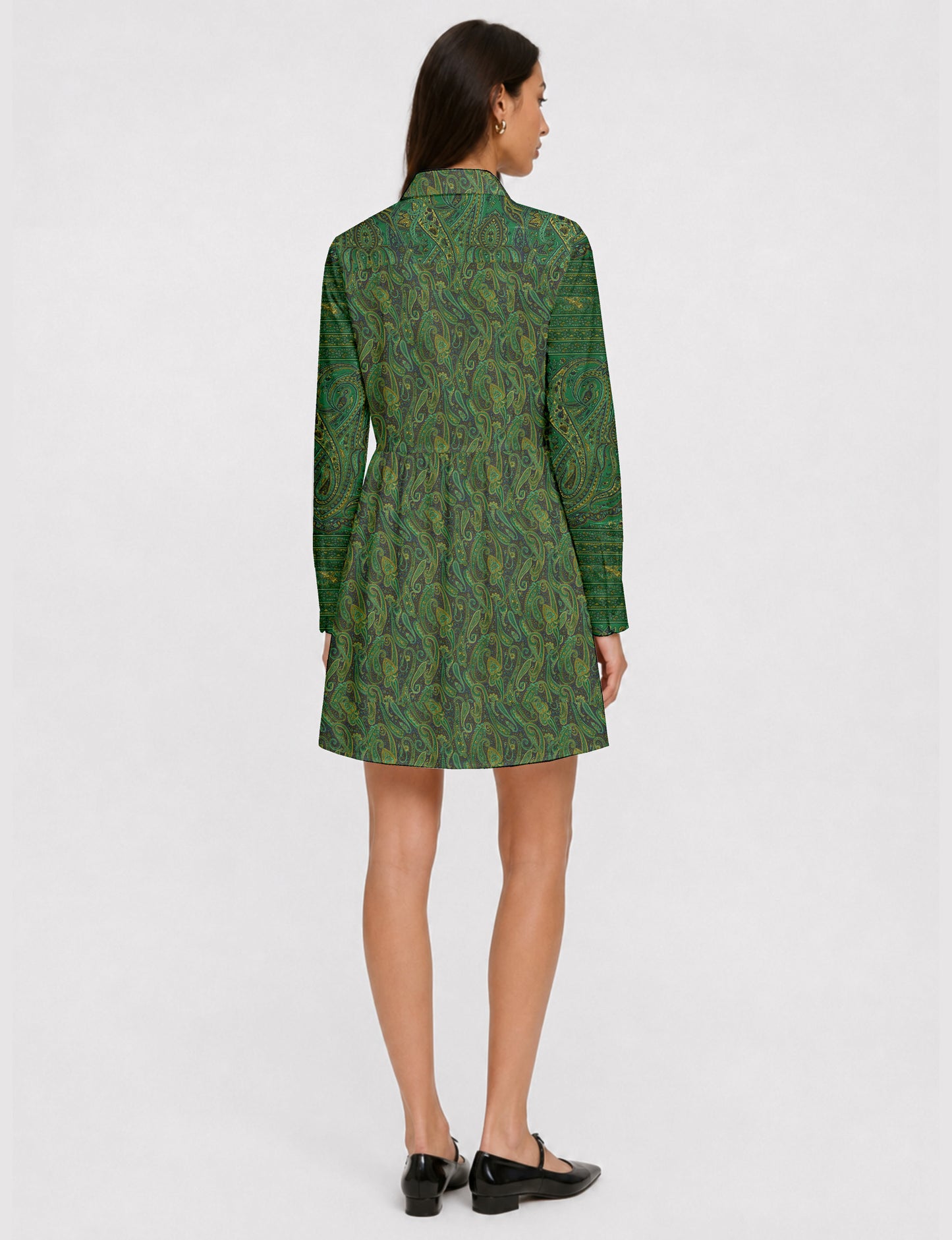 Short shirt dress with a relaxed A-line silhouette, point collar, partial button placket, gathered waist, side pockets, and full-length cuffed sleeves.