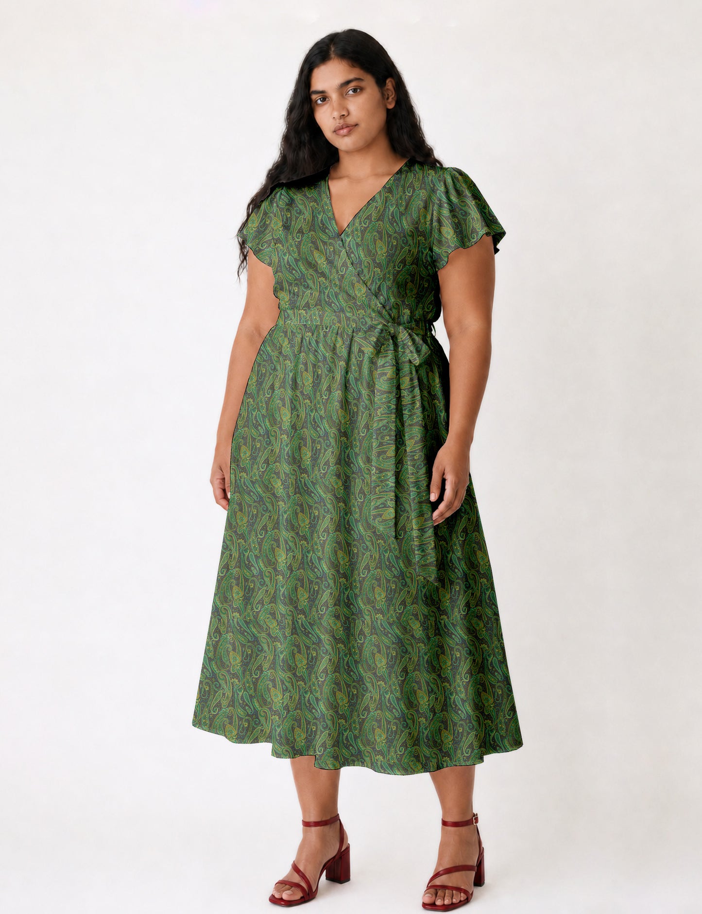Elegant midi wrap dress with a V-neckline, adjustable waist tie, fitted bodice, and flared skirt for a timeless, flattering silhouette.