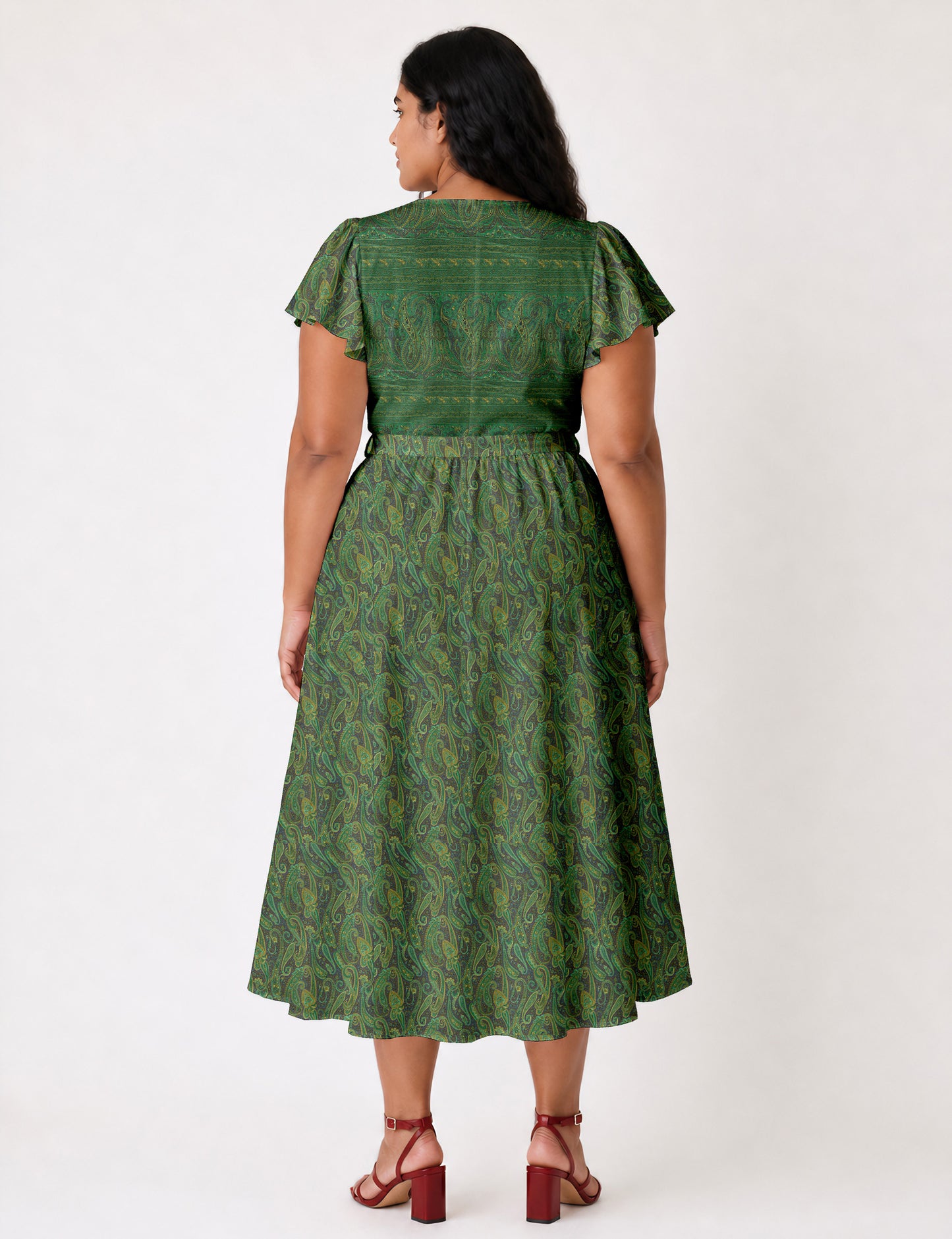 Elegant midi wrap dress with a V-neckline, adjustable waist tie, fitted bodice, and flared skirt for a timeless, flattering silhouette.