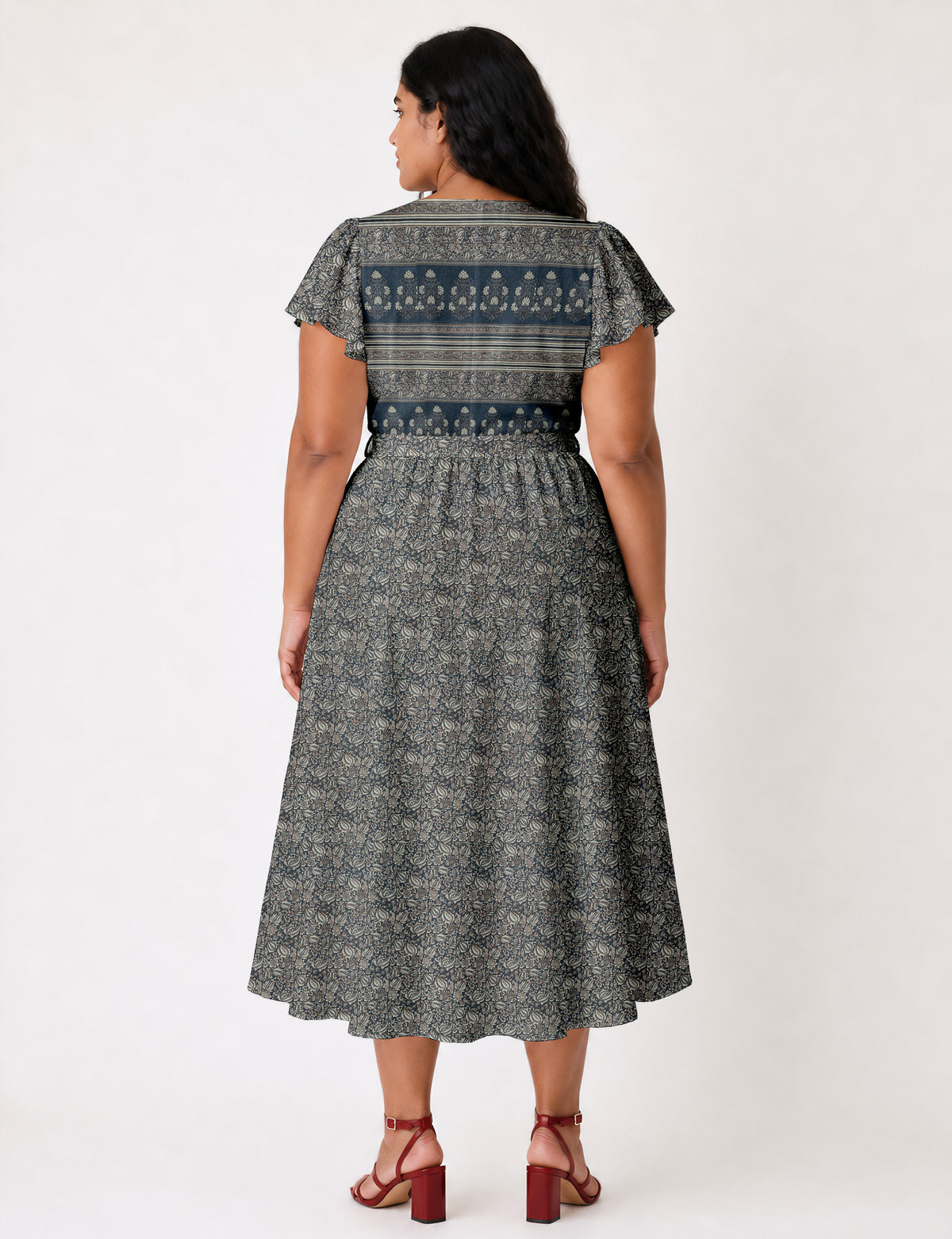 Elegant midi wrap dress with a V-neckline, adjustable waist tie, fitted bodice, and flared skirt for a timeless, flattering silhouette.