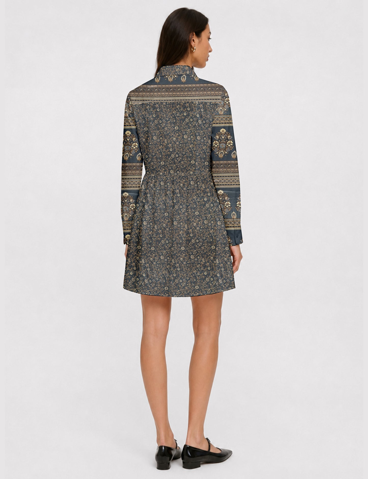 Short shirt dress with a relaxed A-line silhouette, point collar, partial button placket, gathered waist, side pockets, and full-length cuffed sleeves.