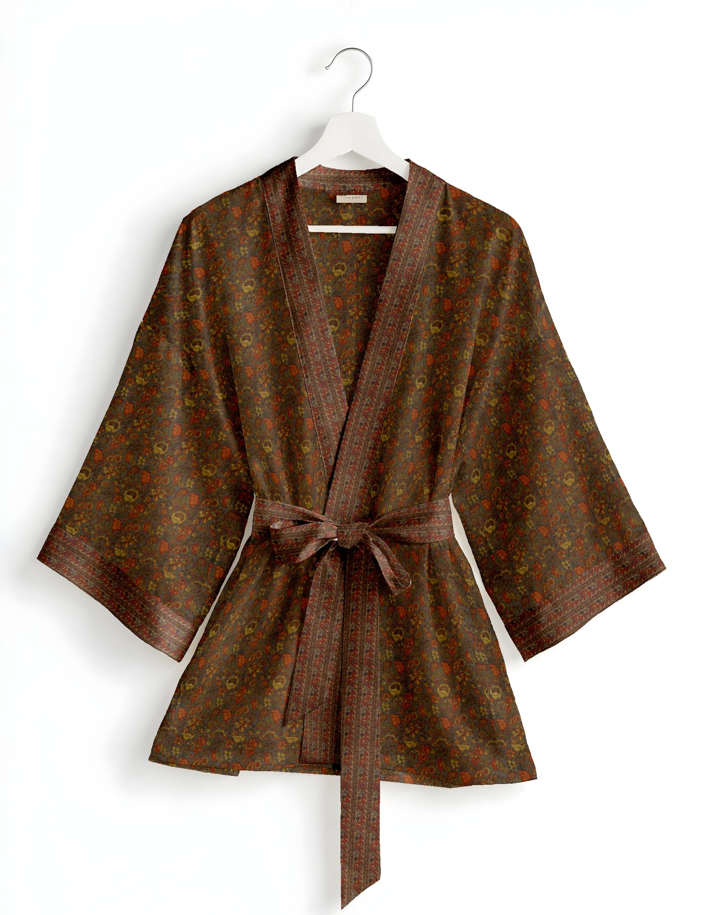Short kimono robe with wrap front, V-neckline, wide sleeves, waist tie, and concealed skort detail.