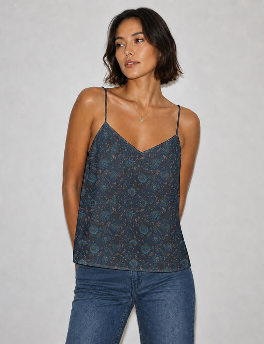 Women's sleeveless slip top with a relaxed straight fit, soft V-neckline, deep V-back, and delicate spaghetti straps.