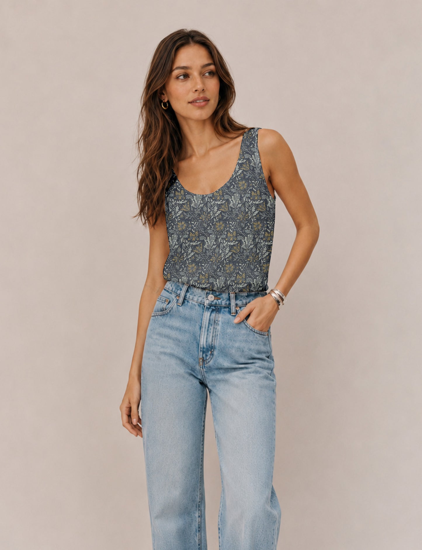 Women's sleeveless blouse with a relaxed straight fit, wide scoop neckline, deep scoop back, and hip-length silhouette.