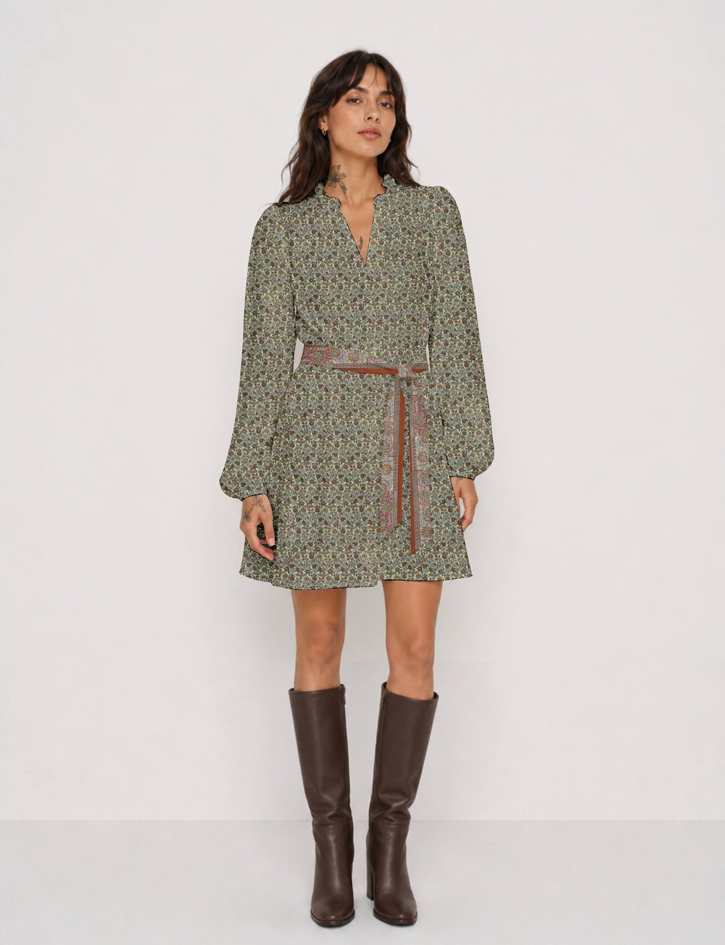 Swing dress with detachable tie belt, gathered ruffle neckline, full-length voluminous sleeves, elastic cuffs, and relaxed A-line silhouette in an above-knee length.