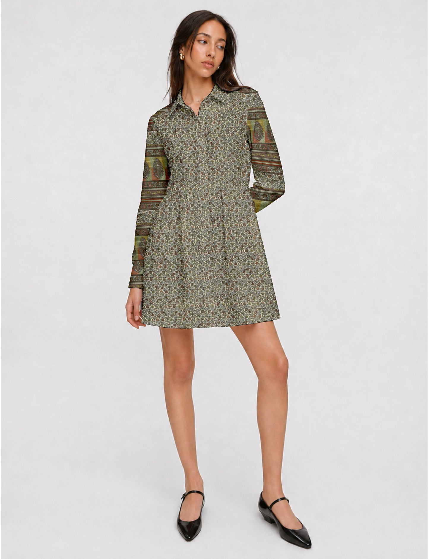 Short shirt dress with a relaxed A-line silhouette, point collar, partial button placket, gathered waist, side pockets, and full-length cuffed sleeves.