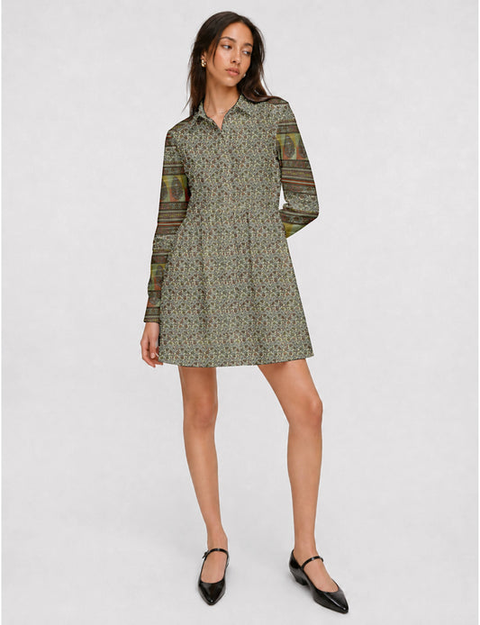 Short shirt dress with a relaxed A-line silhouette, point collar, partial button placket, gathered waist, side pockets, and full-length cuffed sleeves.