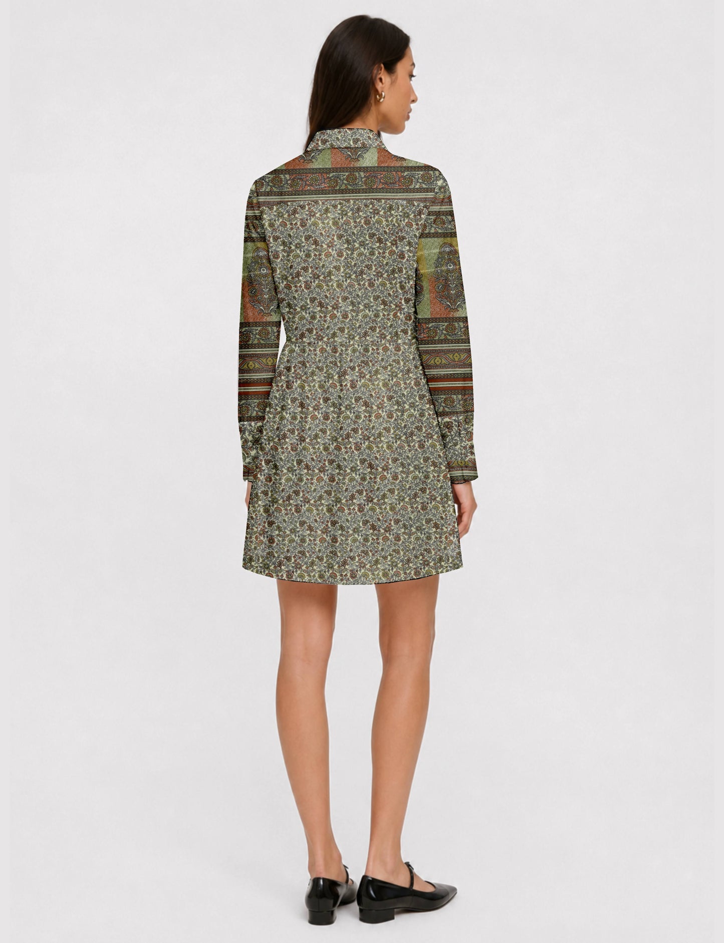 Short shirt dress with a relaxed A-line silhouette, point collar, partial button placket, gathered waist, side pockets, and full-length cuffed sleeves.