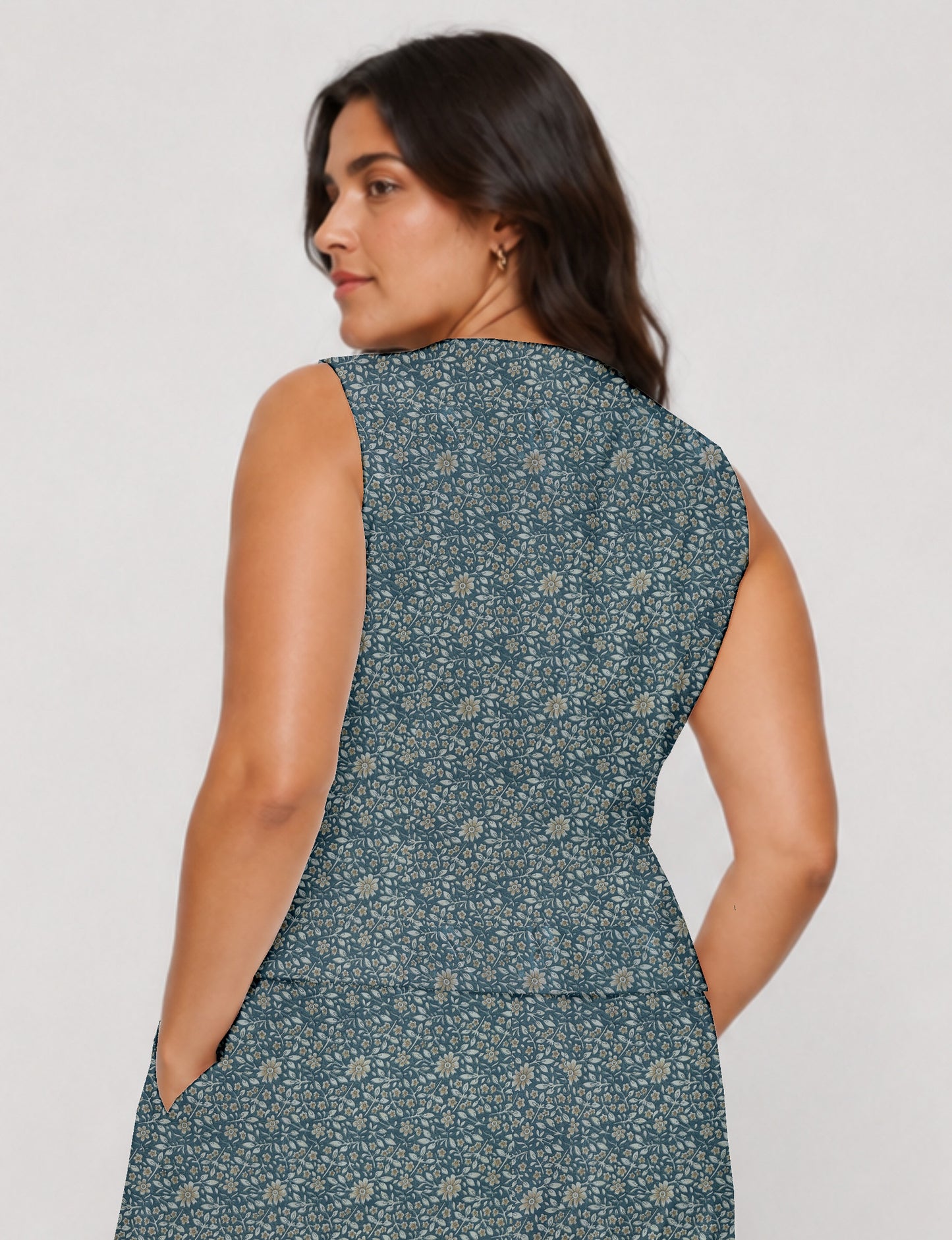 Women's fitted waistcoat with V-neck, single-breasted button closure, tailored silhouette, and pointed hem in sustainable fashion.