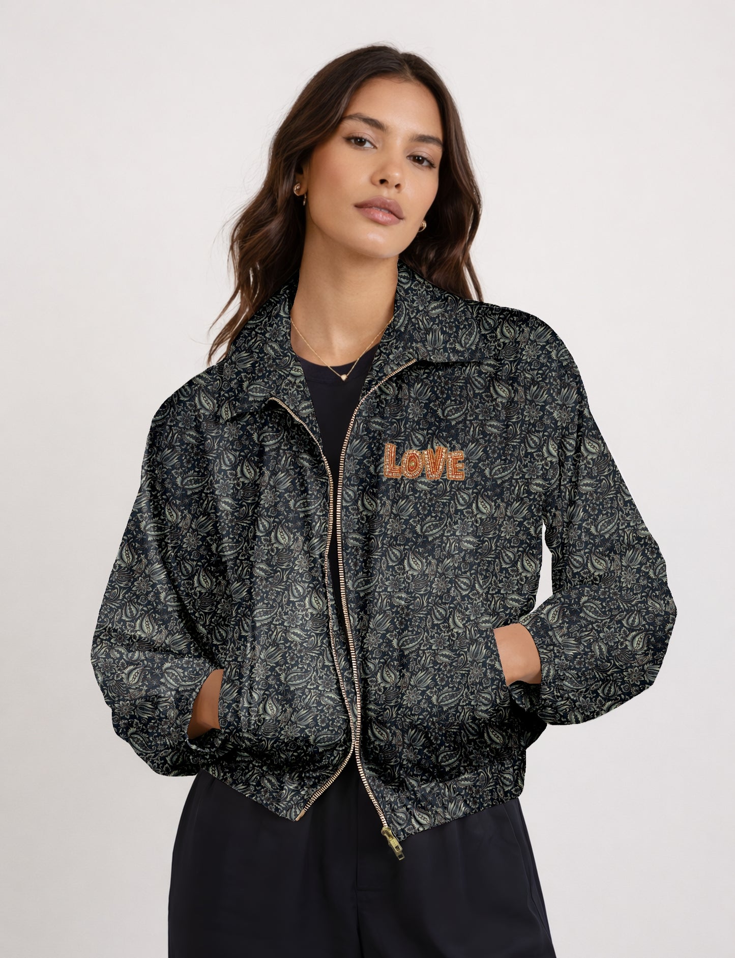 Love Bomber Jacket made from recycled fabric, featuring hand-stitched Aari embroidery. A unique piece of zero-waste clothing, part of the circular fashion movement. Designed with upcycled materials for a stylish yet environmentally friendly clothing choice.