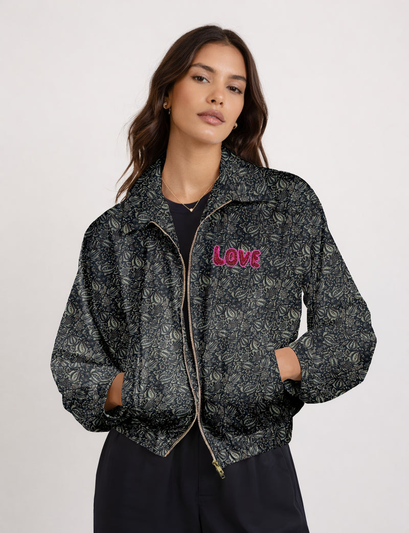 Love Bomber Jacket made from recycled fabric, featuring hand-stitched Aari embroidery. A unique piece of zero-waste clothing, part of the circular fashion movement. Designed with upcycled materials for a stylish yet environmentally friendly clothing choice.