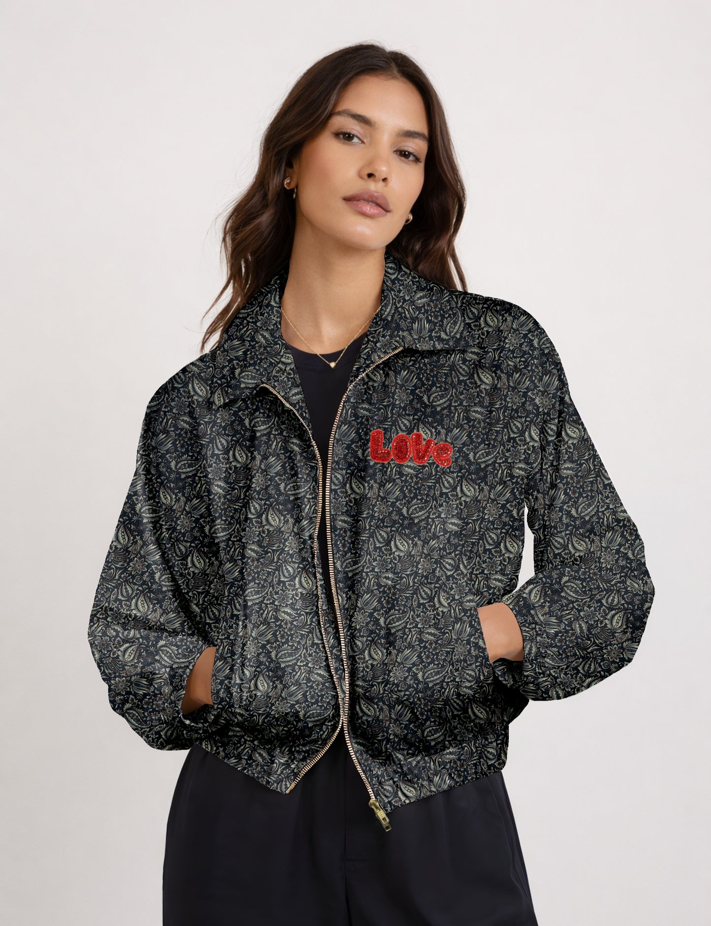 Love Bomber Jacket made from recycled fabric, featuring hand-stitched Aari embroidery. A unique piece of zero-waste clothing, part of the circular fashion movement. Designed with upcycled materials for a stylish yet environmentally friendly clothing choice.