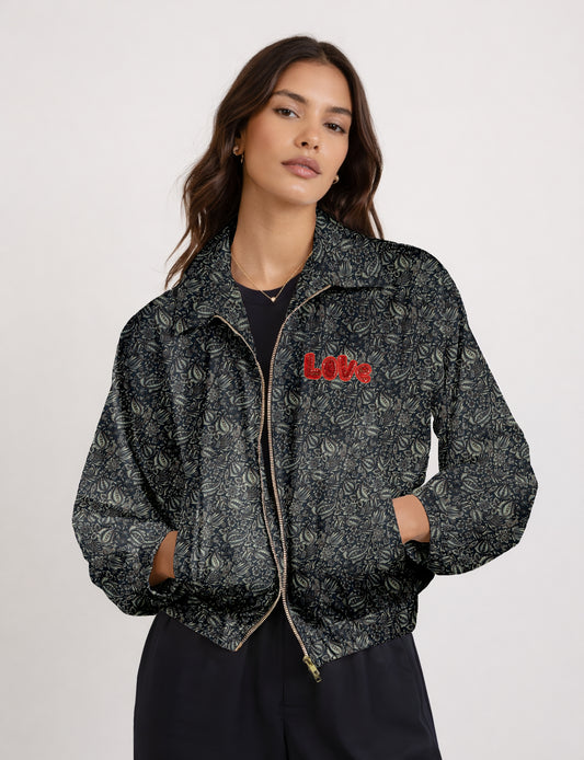 Love Bomber Jacket made from recycled fabric, featuring hand-stitched Aari embroidery. A unique piece of zero-waste clothing, part of the circular fashion movement. Designed with upcycled materials for a stylish yet environmentally friendly clothing choice.