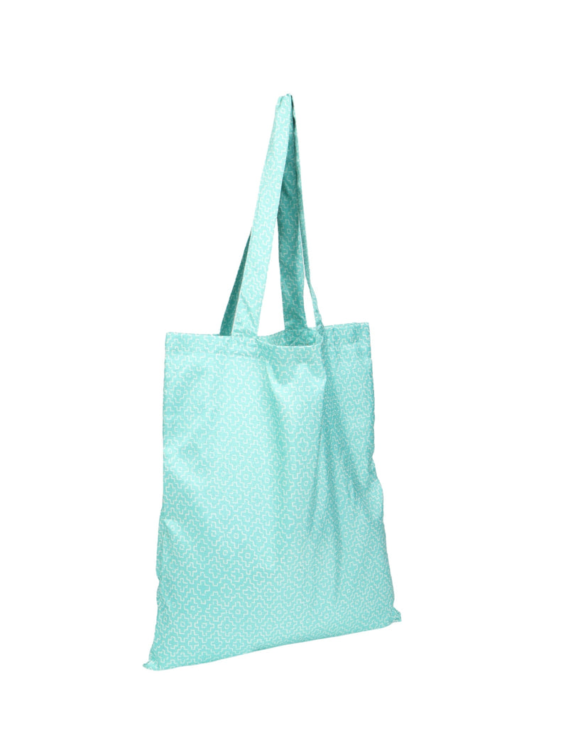 Blue shopper bag with white geometric pattern, long handles, and flat lay view on white background