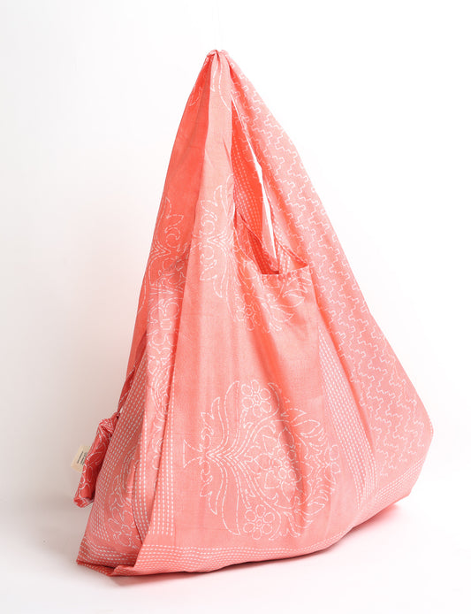 Stay eco-conscious with our Reusable Bag, handmade by Indian artisans from pre-loved saris. Silky and lightweight, this foldaway bag is perfect for your on-the-go lifestyle. Each piece is a unique statement of ethical fashion, embracing sustainability and style.