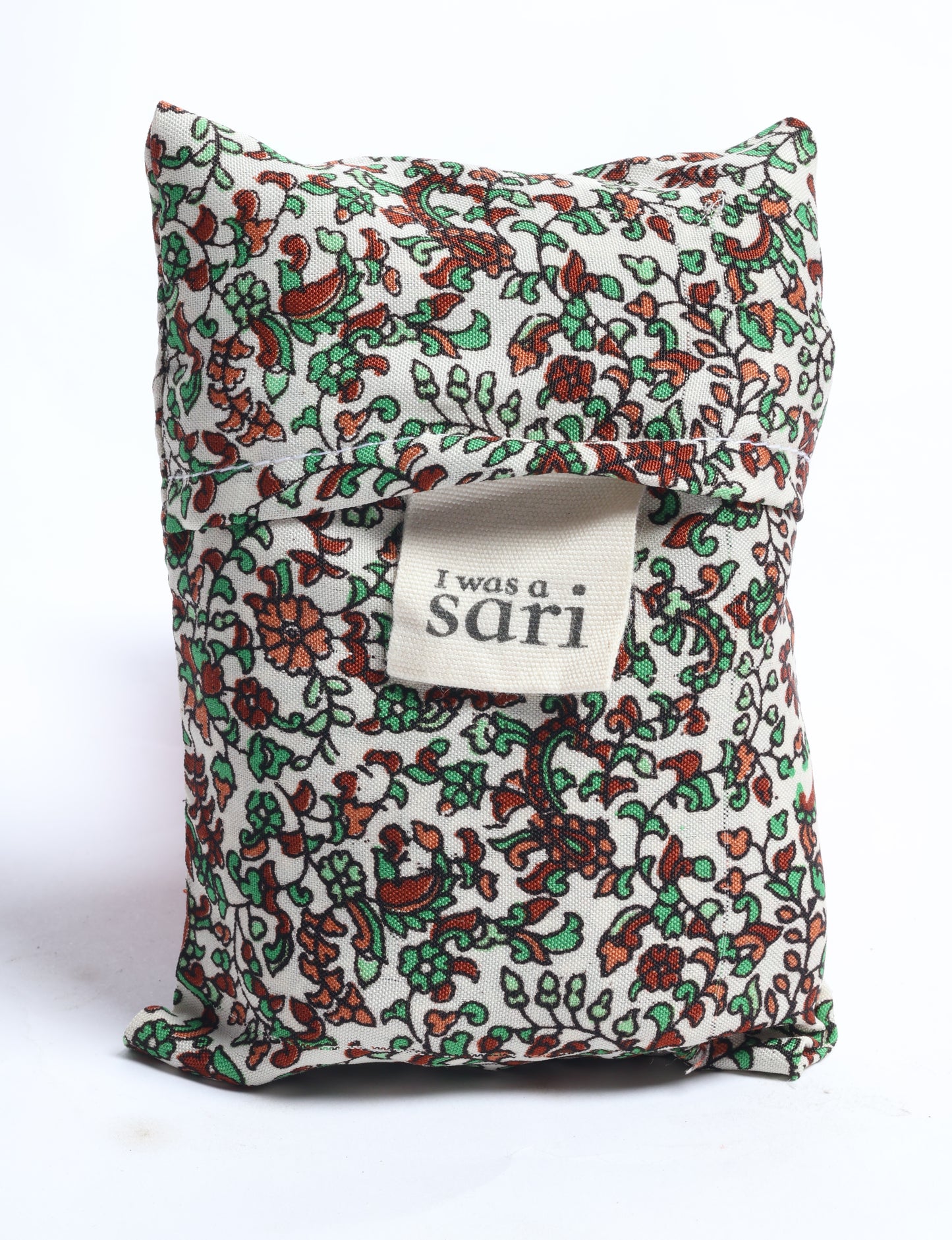 Stay eco-conscious with our Reusable Bag, handmade by Indian artisans from pre-loved saris. Silky and lightweight, this foldaway bag is perfect for your on-the-go lifestyle. Each piece is a unique statement of ethical fashion, embracing sustainability and style.