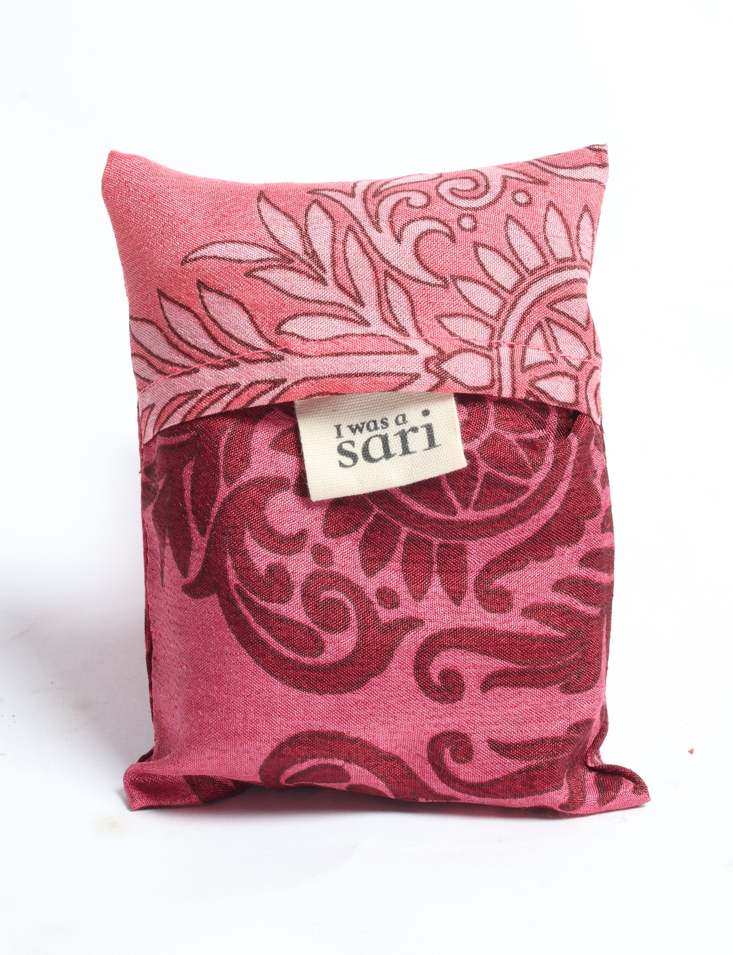 Stay eco-conscious with our Reusable Bag, handmade by Indian artisans from pre-loved saris. Silky and lightweight, this foldaway bag is perfect for your on-the-go lifestyle. Each piece is a unique statement of ethical fashion, embracing sustainability and style.