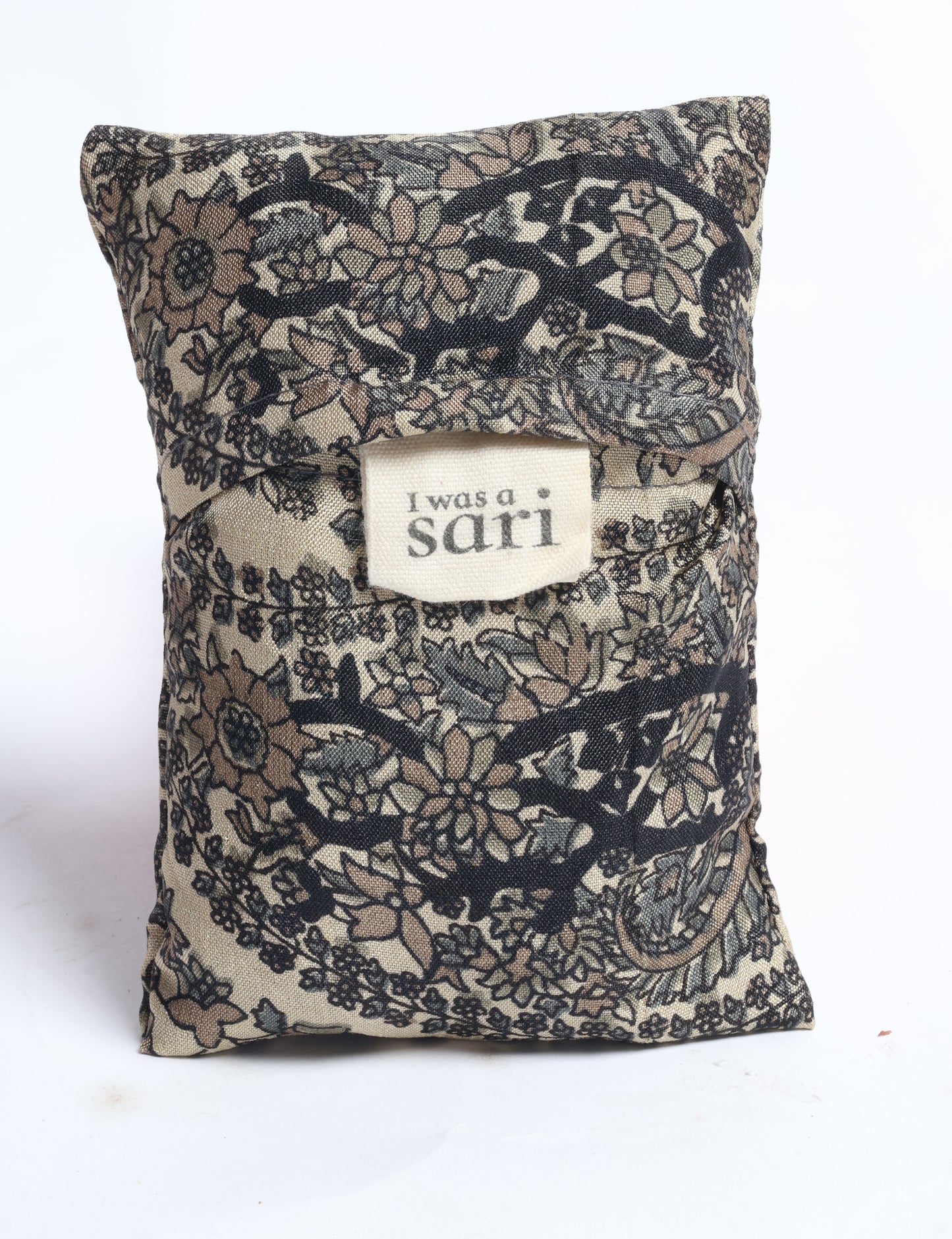 Stay eco-conscious with our Reusable Bag, handmade by Indian artisans from pre-loved saris. Silky and lightweight, this foldaway bag is perfect for your on-the-go lifestyle. Each piece is a unique statement of ethical fashion, embracing sustainability and style.