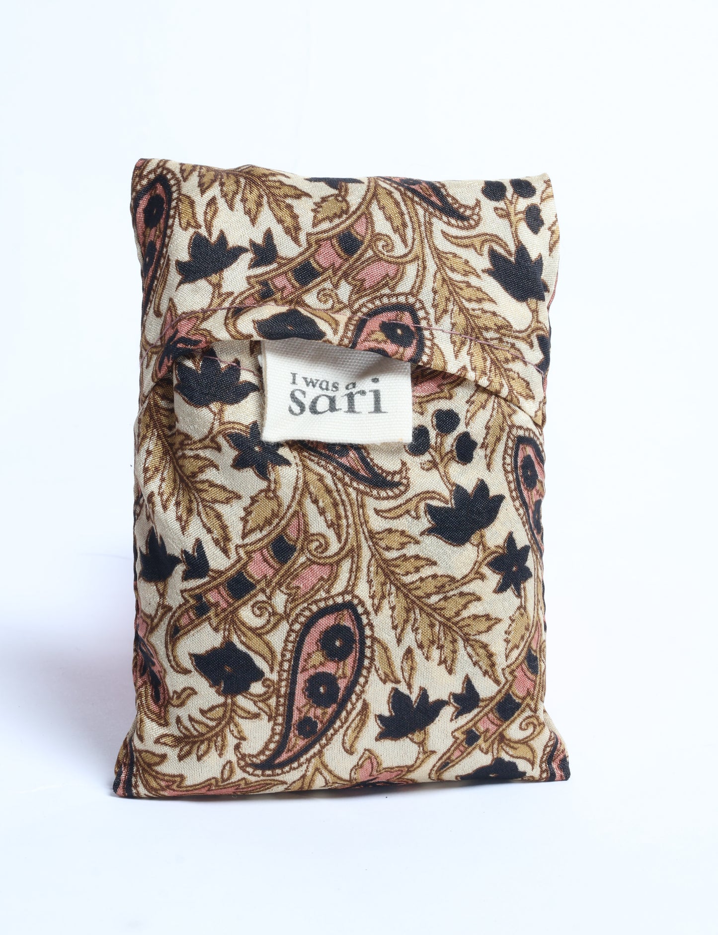Stay eco-conscious with our Reusable Bag, handmade by Indian artisans from pre-loved saris. Silky and lightweight, this foldaway bag is perfect for your on-the-go lifestyle. Each piece is a unique statement of ethical fashion, embracing sustainability and style.
