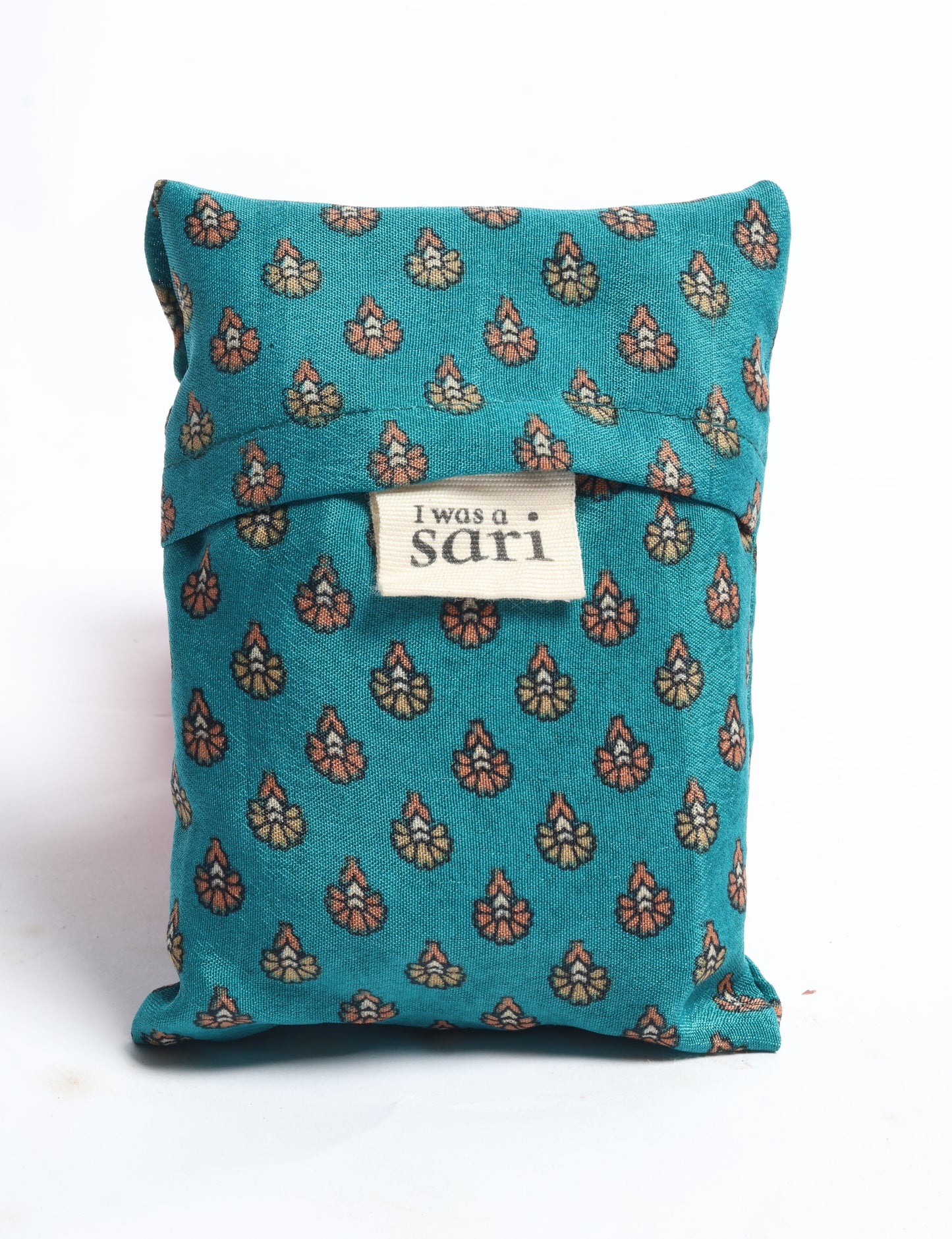 Stay eco-conscious with our Reusable Bag, handmade by Indian artisans from pre-loved saris. Silky and lightweight, this foldaway bag is perfect for your on-the-go lifestyle. Each piece is a unique statement of ethical fashion, embracing sustainability and style.