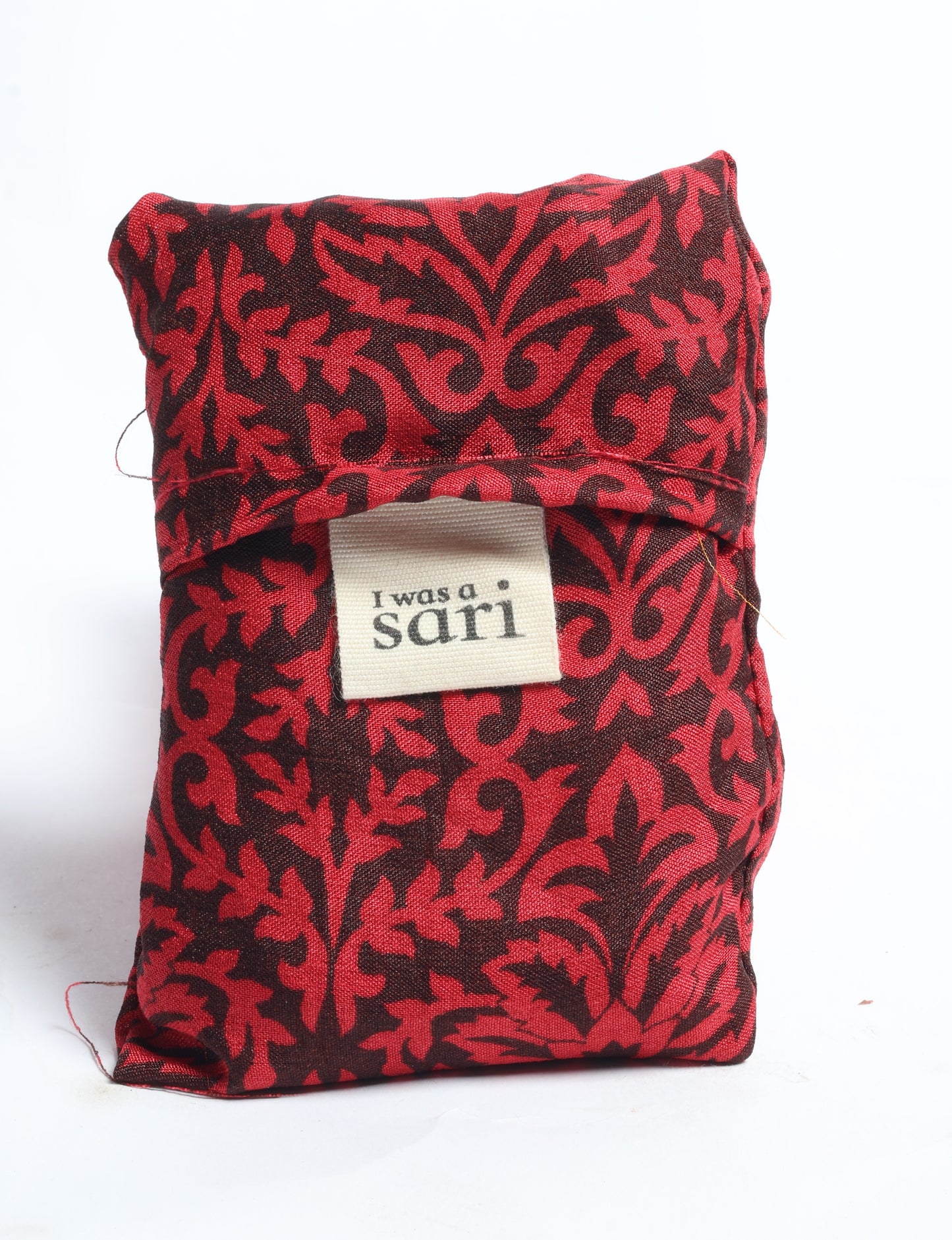 Stay eco-conscious with our Reusable Bag, handmade by Indian artisans from pre-loved saris. Silky and lightweight, this foldaway bag is perfect for your on-the-go lifestyle. Each piece is a unique statement of ethical fashion, embracing sustainability and style.