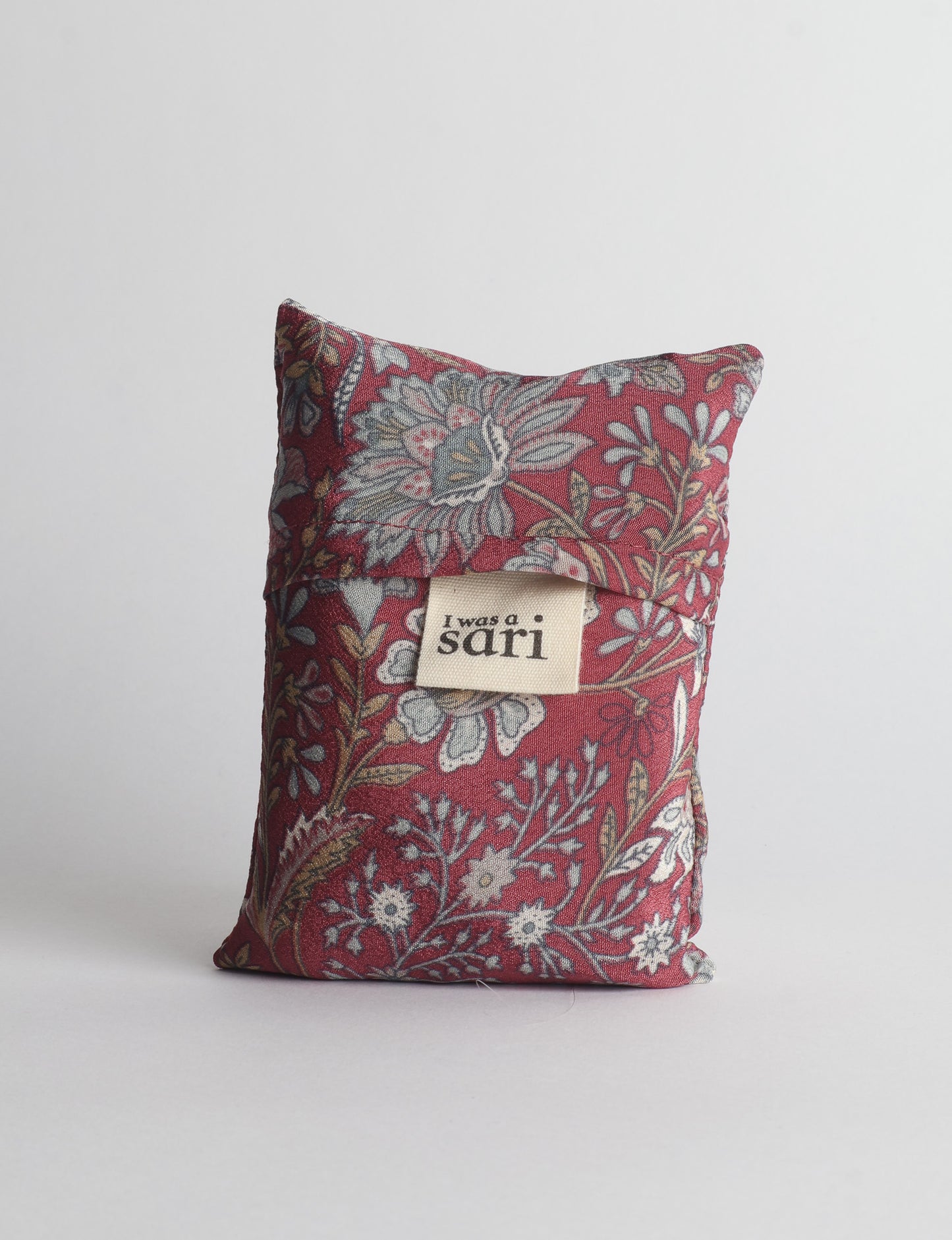 Stay eco-conscious with our Reusable Bag, handmade by Indian artisans from pre-loved saris. Silky and lightweight, this foldaway bag is perfect for your on-the-go lifestyle. Each piece is a unique statement of ethical fashion, embracing sustainability and style.