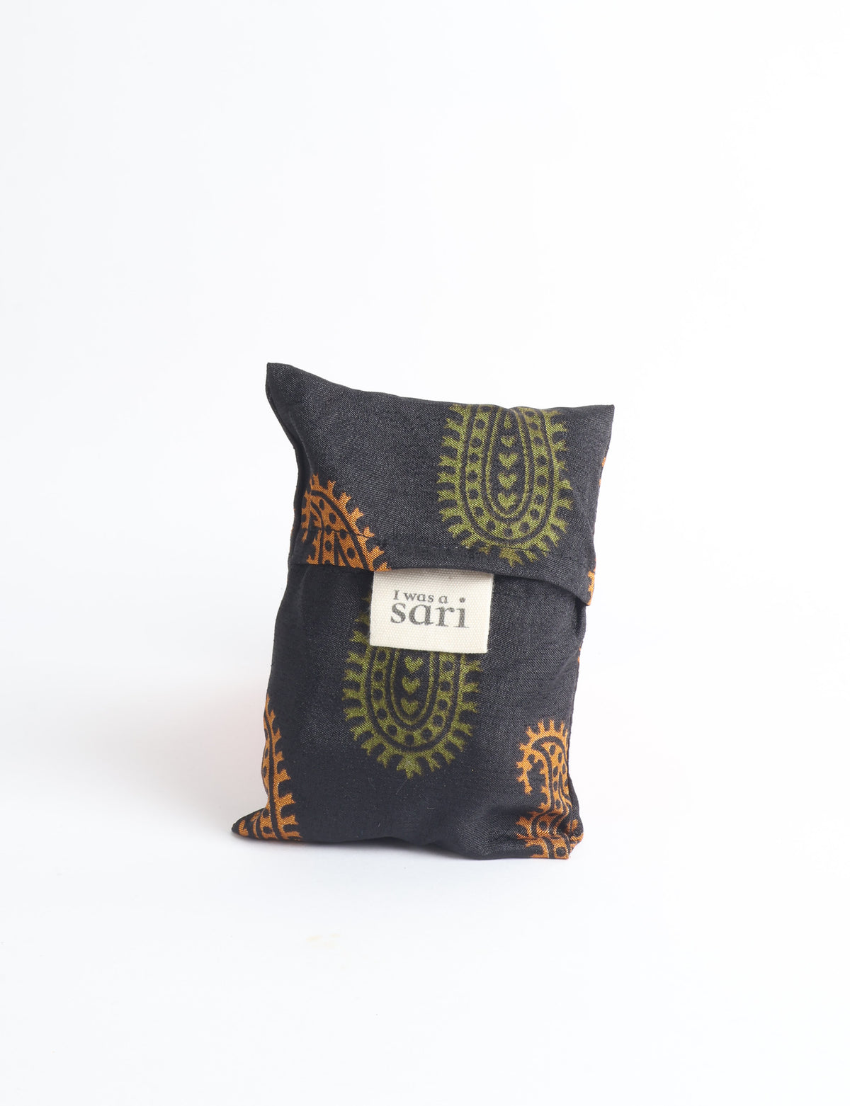Blue reusable bag with multicolor tropical floral pattern folded with "I was a sari" label visible on front