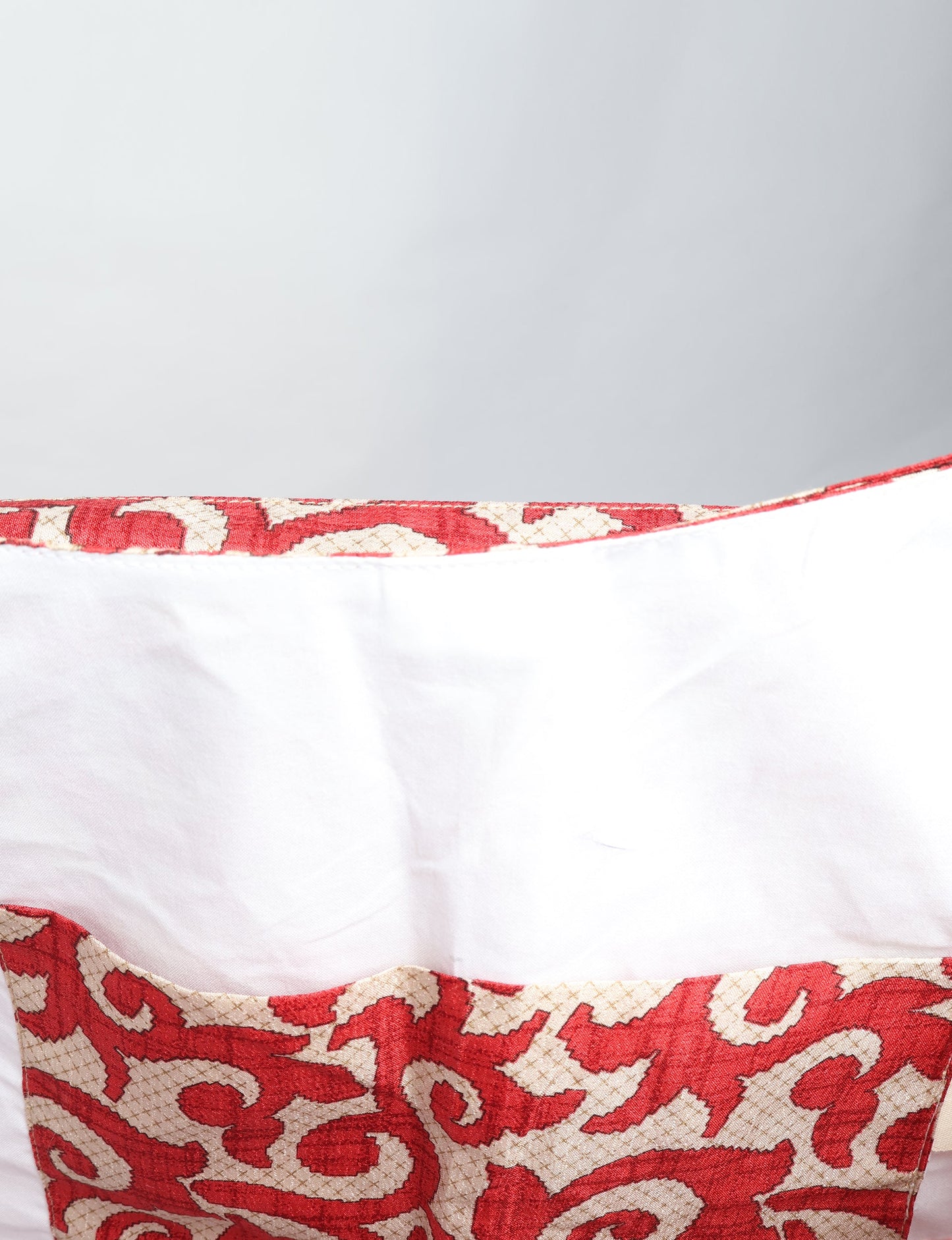 Trapeze bag made from repurposed sari fabric, featuring bold patterns and eco friendly cloth design—part of a sustainable women's clothing collection.