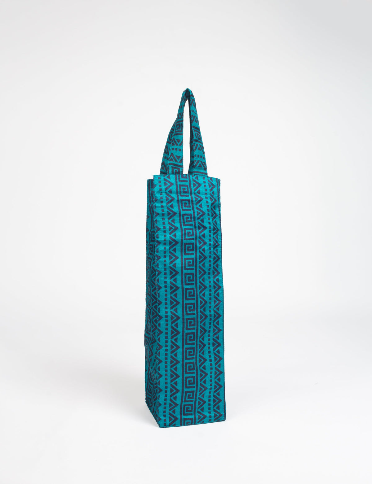 Blue fabric wine bag with dark geometric patterns, rectangular shape, and two handles, shown standing upright