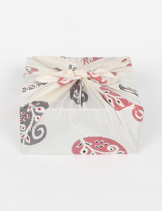 A delicately handcrafted wrap made from recycled sari offcuts, blending sustainable fashion with conscious design. This eco-friendly product showcases the beauty of upcycling and green fashion, making it a perfect accessory for those supporting circular fashion and products made from textile waste.