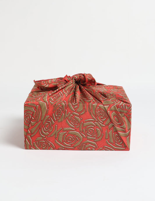 A delicately handcrafted wrap made from recycled sari offcuts, blending sustainable fashion with conscious design. This eco-friendly product showcases the beauty of upcycling and green fashion, making it a perfect accessory for those supporting circular fashion and products made from textile waste.