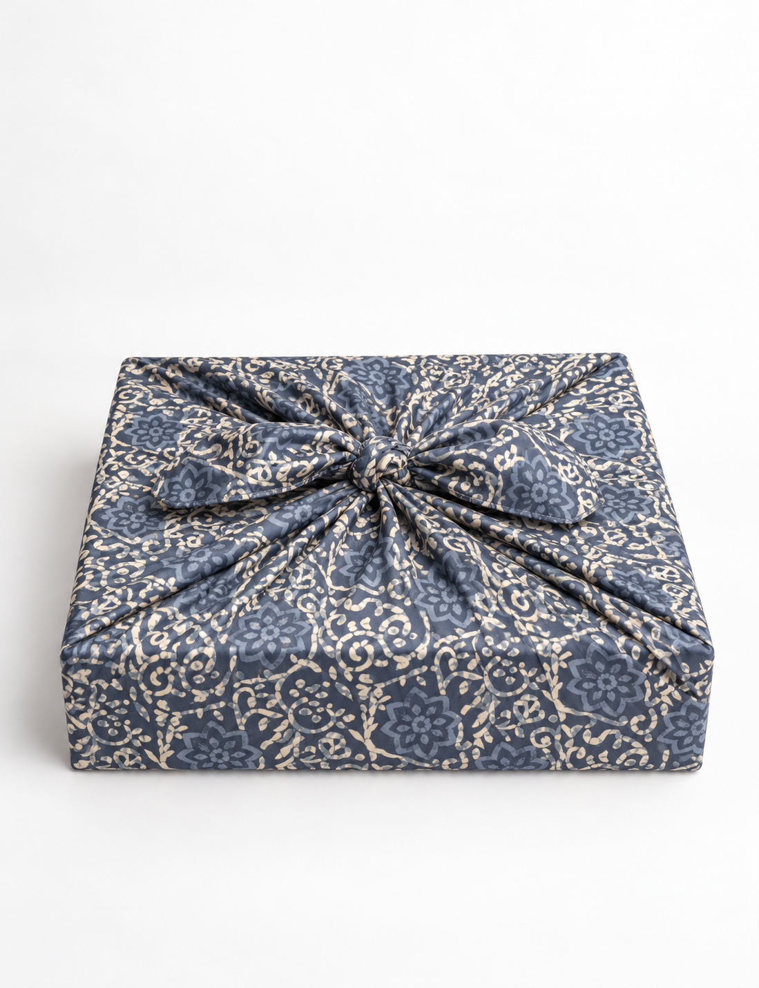 A delicately handcrafted wrap made from recycled sari offcuts, blending sustainable fashion with conscious design. This eco-friendly product showcases the beauty of upcycling and green fashion, making it a perfect accessory for those supporting circular fashion and products made from textile waste.