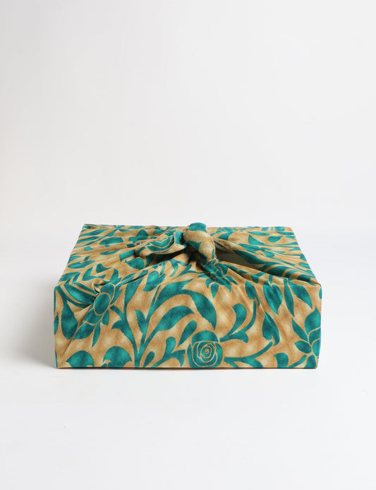 A delicately handcrafted wrap made from recycled sari offcuts, blending sustainable fashion with conscious design. This eco-friendly product showcases the beauty of upcycling and green fashion, making it a perfect accessory for those supporting circular fashion and products made from textile waste.