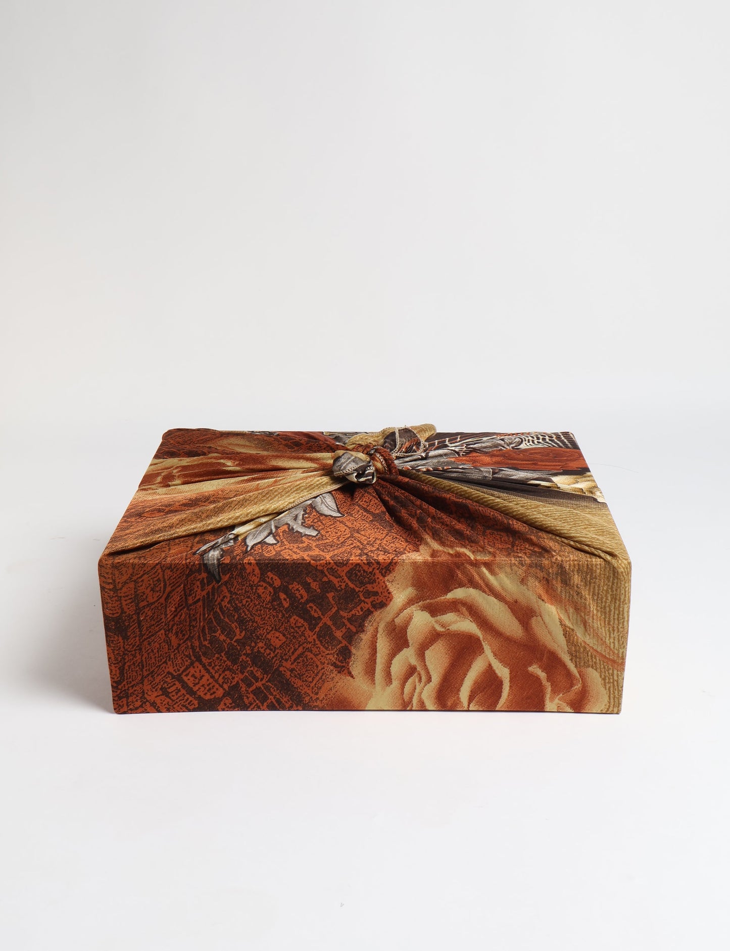 A delicately handcrafted wrap made from recycled sari offcuts, blending sustainable fashion with conscious design. This eco-friendly product showcases the beauty of upcycling and green fashion, making it a perfect accessory for those supporting circular fashion and products made from textile waste.