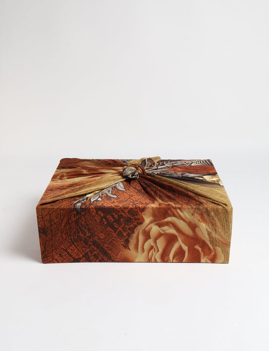 A delicately handcrafted wrap made from recycled sari offcuts, blending sustainable fashion with conscious design. This eco-friendly product showcases the beauty of upcycling and green fashion, making it a perfect accessory for those supporting circular fashion and products made from textile waste.