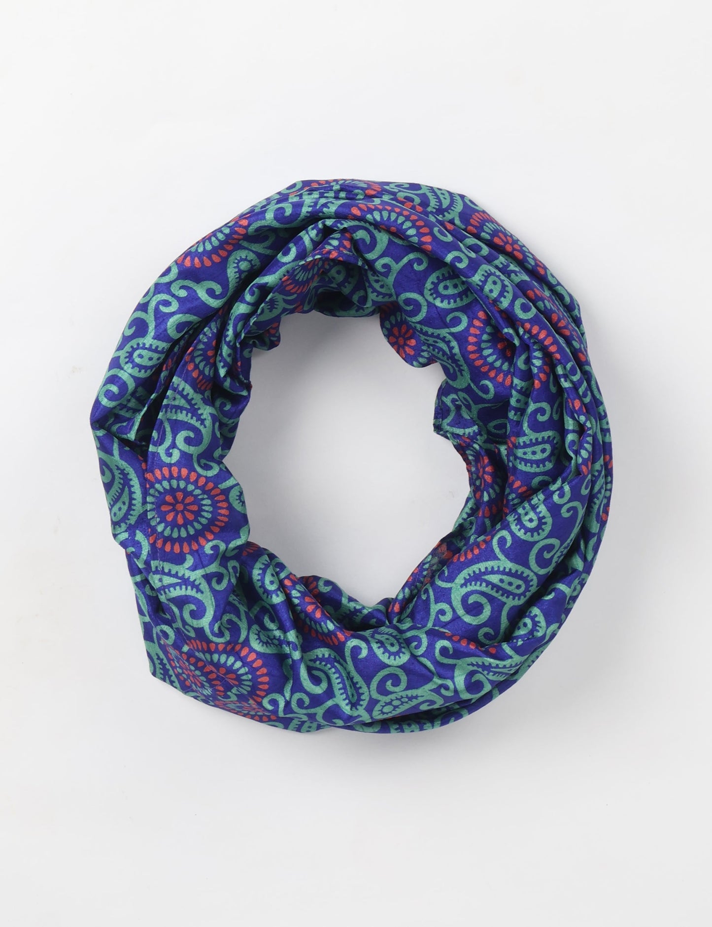 Sustainable style embraces you with our LOOP SCARF – an infinity-style scarf crafted from vibrant, pattern-rich saris. Handcrafted by experienced Mumbai-based artisans, this versatile scarf can be worn looped once or twice around your neck or as a head-wrap. From laid-back beach vacations to dress-to-impress dinners, this scarf is a timeless accessory.