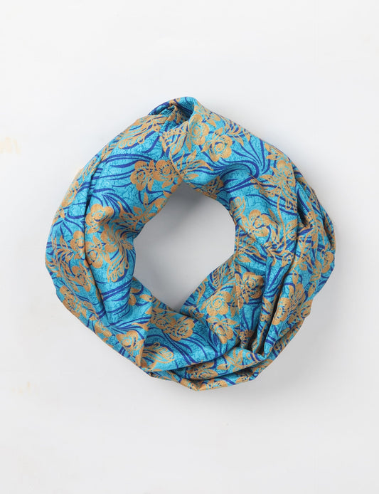Sustainable style embraces you with our LOOP SCARF – an infinity-style scarf crafted from vibrant, pattern-rich saris. Handcrafted by experienced Mumbai-based artisans, this versatile scarf can be worn looped once or twice around your neck or as a head-wrap. From laid-back beach vacations to dress-to-impress dinners, this scarf is a timeless accessory.