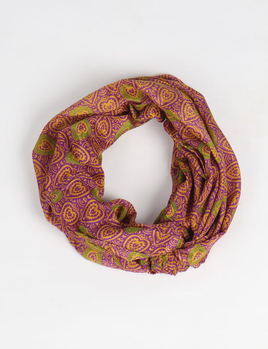 Sustainable style embraces you with our LOOP SCARF – an infinity-style scarf crafted from vibrant, pattern-rich saris. Handcrafted by experienced Mumbai-based artisans, this versatile scarf can be worn looped once or twice around your neck or as a head-wrap. From laid-back beach vacations to dress-to-impress dinners, this scarf is a timeless accessory.