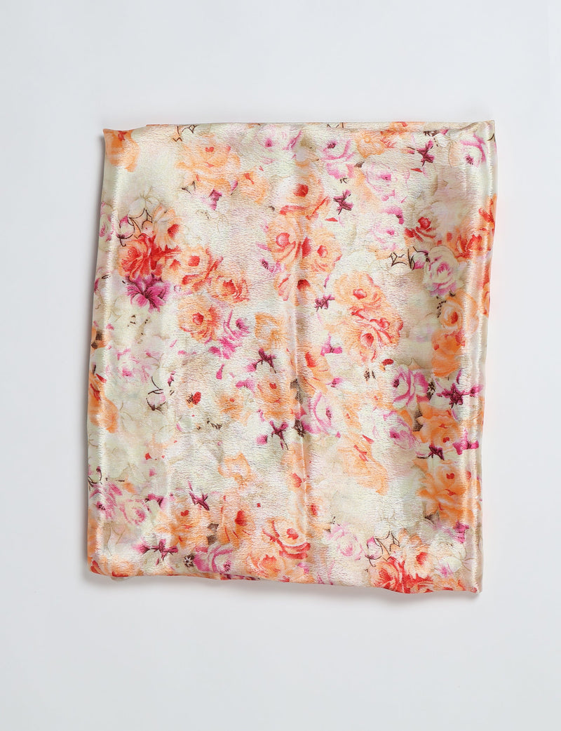 Beige pareo with orange, pink, and red floral print, folded flat on a white background