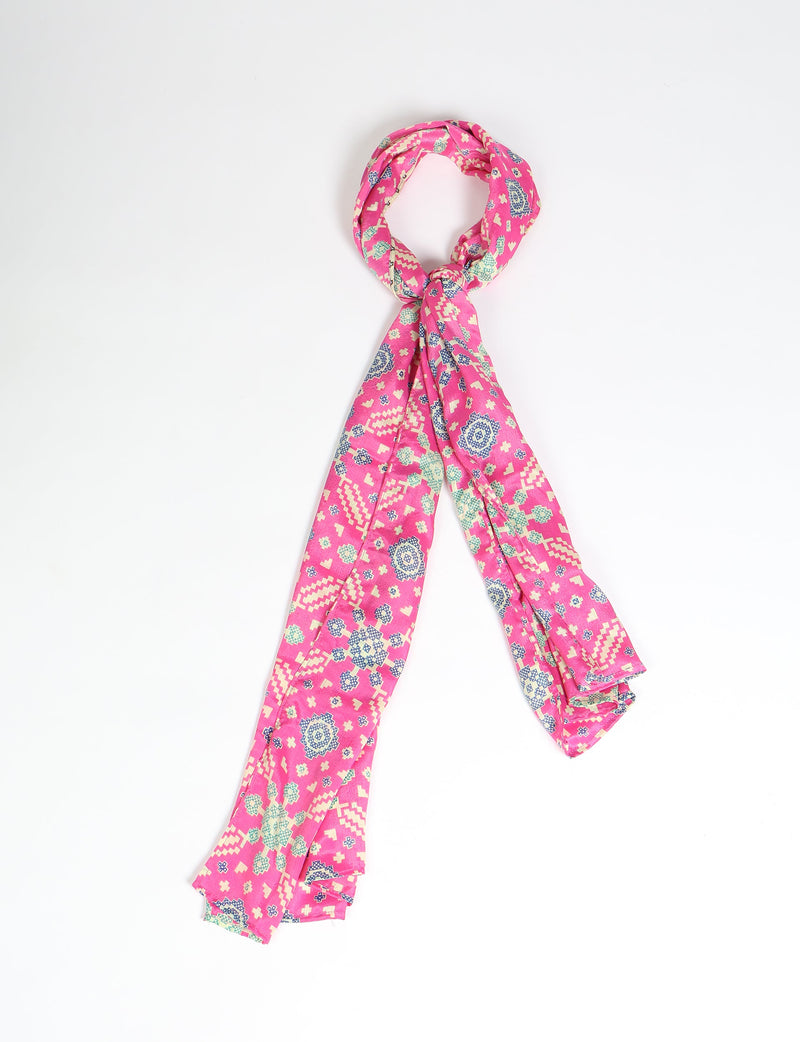 Pink stole with blue and cream ethnic geometric patterns, shown knotted on a white background