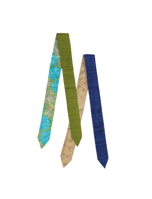 Colorful sustainable headband made from recycled fabric, representing fair trade, circular fashion, and carbon neutral clothing for mindful wardrobes.