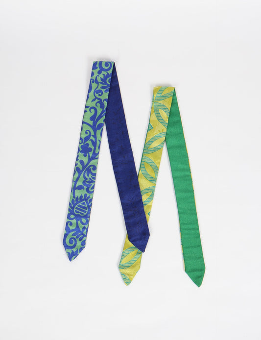 Colorful sustainable headband made from recycled fabric, representing fair trade, circular fashion, and carbon neutral clothing for mindful wardrobes.