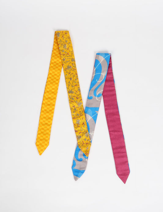 Colorful sustainable headband made from recycled fabric, representing fair trade, circular fashion, and carbon neutral clothing for mindful wardrobes.