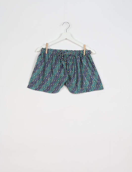 Elevate your wardrobe with our eco-friendly shorts. The all-around elastic waist and drawstring tie provide comfort and style. Crafted with ethical and sustainable practices, these shorts redefine green fashion, making them a perfect addition to your conscious clothing collection.