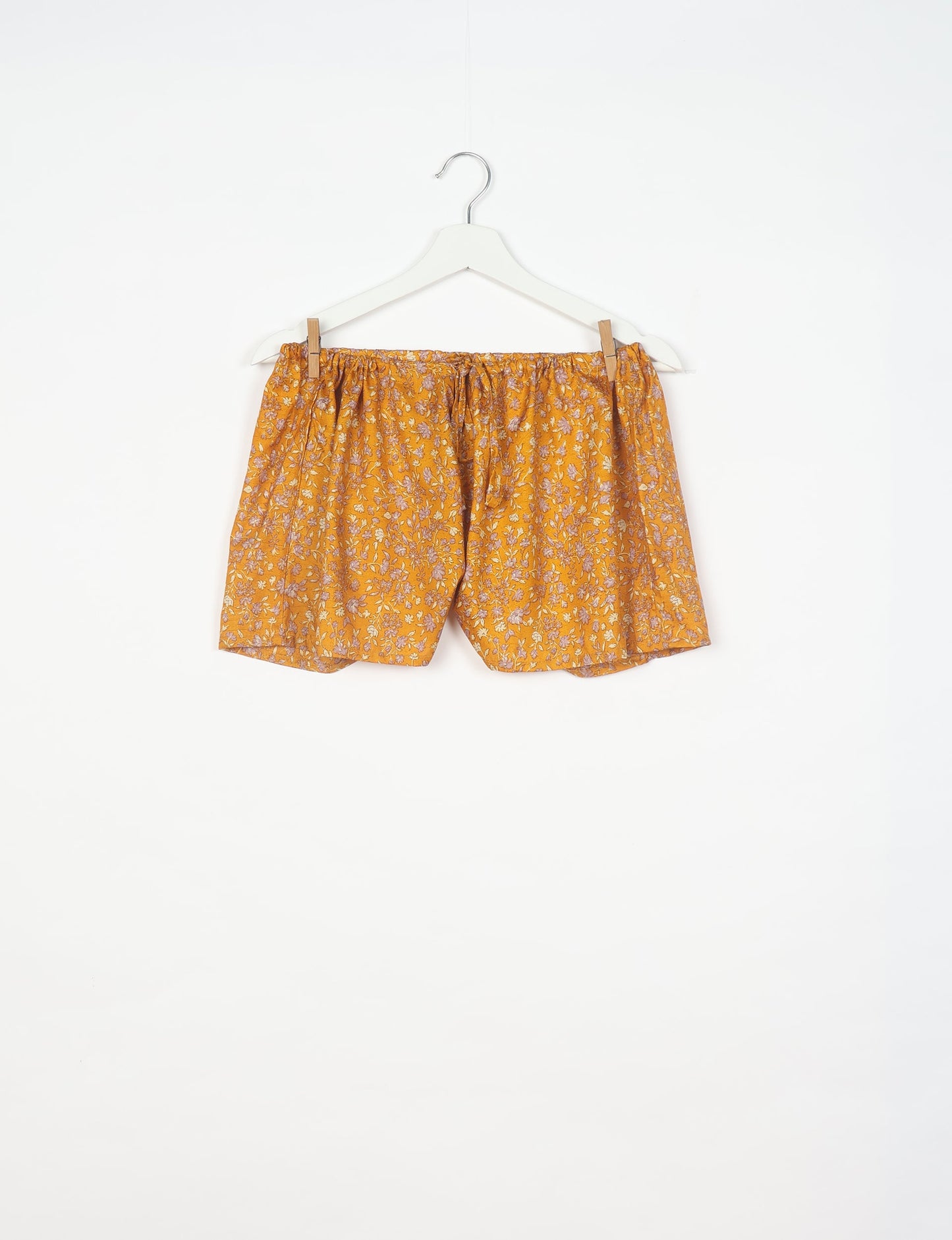 Elevate your wardrobe with our eco-friendly shorts. The all-around elastic waist and drawstring tie provide comfort and style. Crafted with ethical and sustainable practices, these shorts redefine green fashion, making them a perfect addition to your conscious clothing collection.