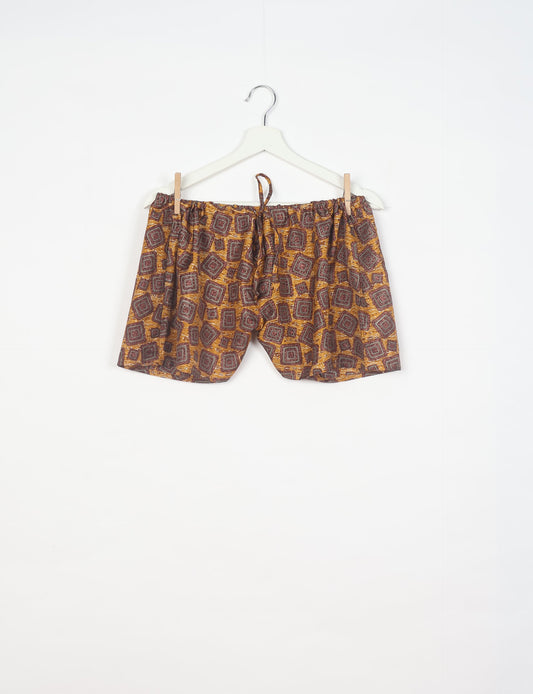 Elevate your wardrobe with our eco-friendly shorts. The all-around elastic waist and drawstring tie provide comfort and style. Crafted with ethical and sustainable practices, these shorts redefine green fashion, making them a perfect addition to your conscious clothing collection.