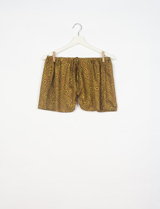 Elevate your wardrobe with our eco-friendly shorts. The all-around elastic waist and drawstring tie provide comfort and style. Crafted with ethical and sustainable practices, these shorts redefine green fashion, making them a perfect addition to your conscious clothing collection.