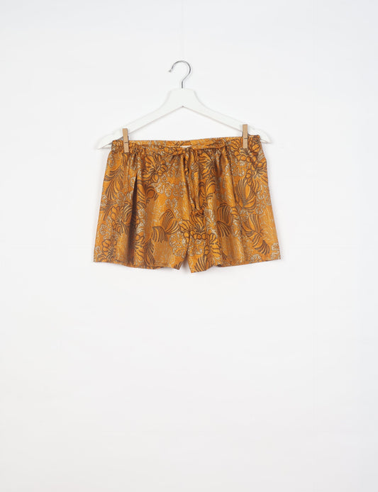 Elevate your wardrobe with our eco-friendly shorts. The all-around elastic waist and drawstring tie provide comfort and style. Crafted with ethical and sustainable practices, these shorts redefine green fashion, making them a perfect addition to your conscious clothing collection.
